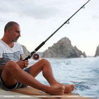 Christian Audigier catches a huge fish with his girlfriend Nathalie Sorensen | Picture 124251